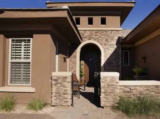 Single-story residential home with fresh stucco exterior finish in Reno, NV.